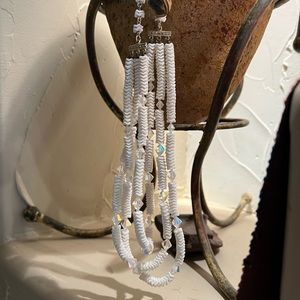 Beautiful white triple strand necklace. 16” long.